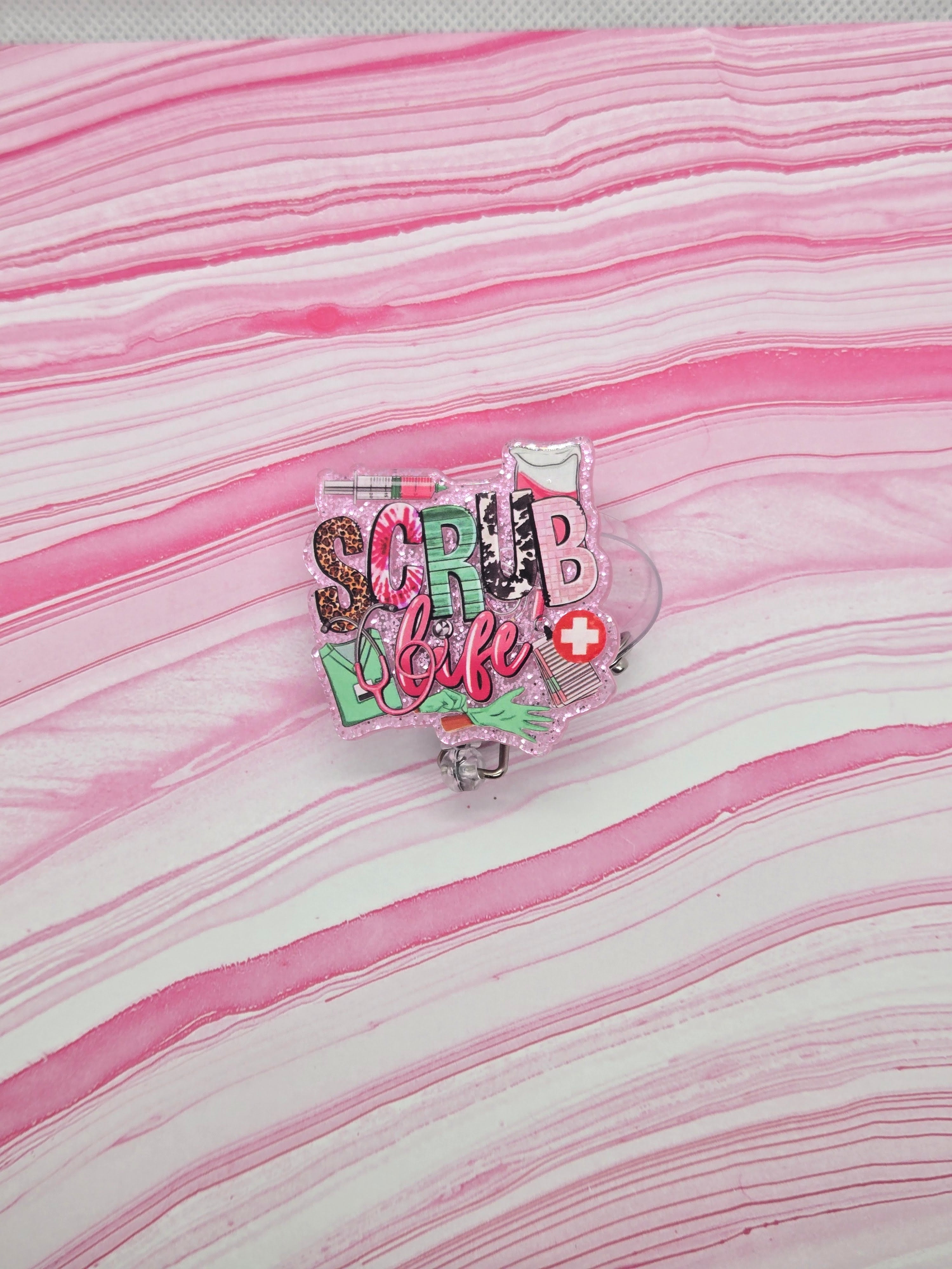 Badge reel scrub life -1