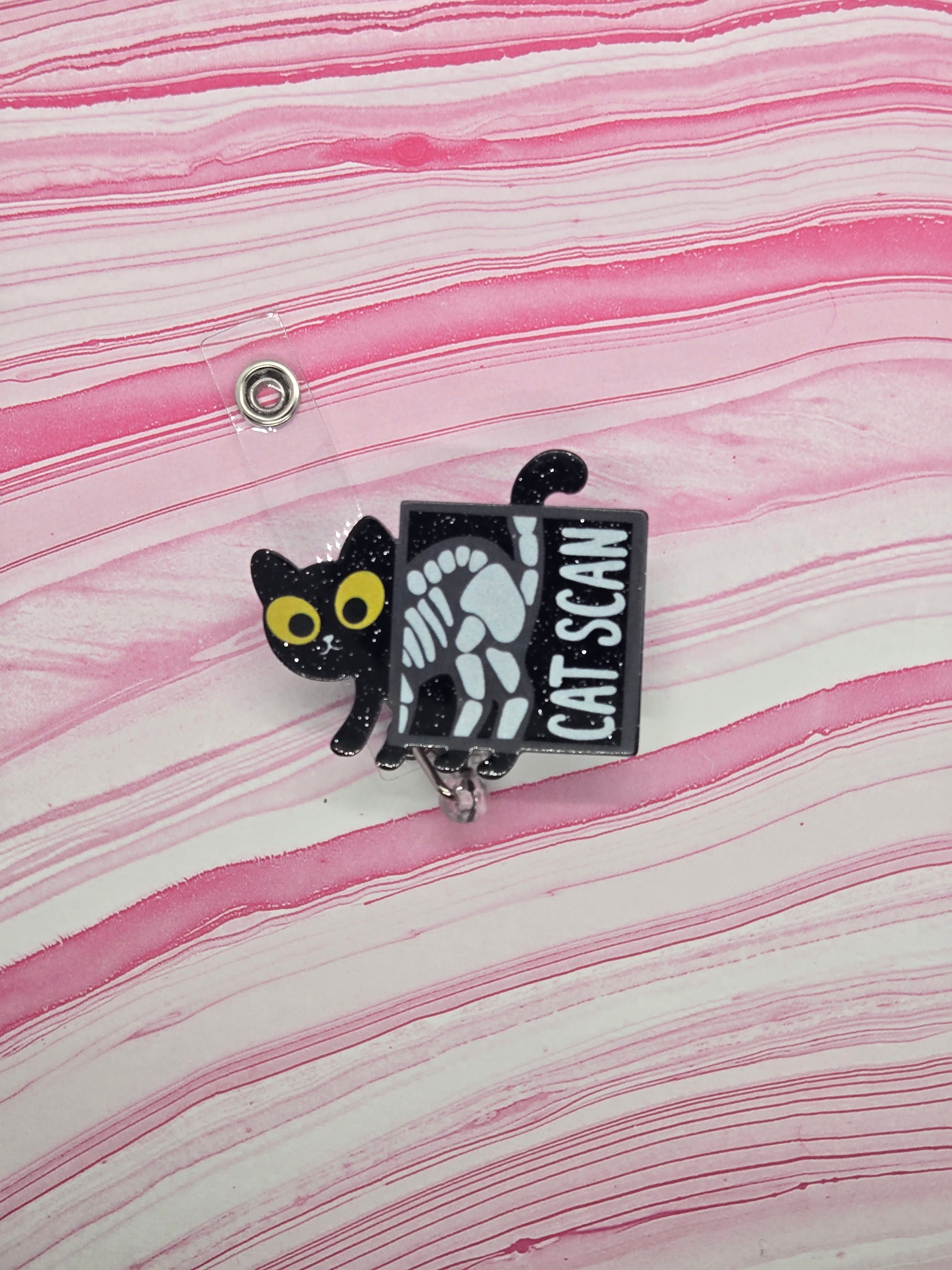 Badge reel cat scan